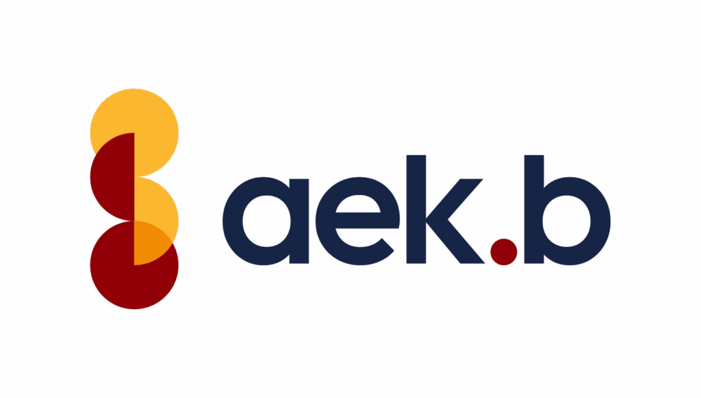 Logo von aek.b mit gelben und roten Kreisen, gestaltet von Webschmiede in Oberwart.